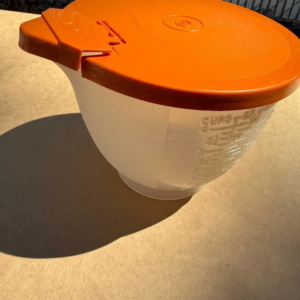 Vintage Tupperware Orange Lidded Measuring Cup